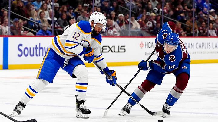 Nov 13, 2025; Denver, Colorado, USA; Buffalo Sabres left wing Jordan Greenway (12) and Colorado Avalanche left wing Taylor Makar (16) battle for the puck in the first period at Ball Arena. Mandatory Credit: Ron Chenoy-Imagn Images Nov 13, 2025; Denver, Colorado, USA; Buffalo Sabres left wing Jordan Greenway (12) and Colorado Avalanche left wing Taylor Makar (16) battle for the puck in the first period at Ball Arena. Mandatory Credit: Ron Chenoy-Imagn Images