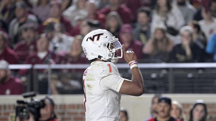 Nov 15, 2025; Tallahassee, Fla.; Virginia Tech quarterback Kyron Drones (1) celebrates a touchdown against Florida State. Nov 15, 2025; Tallahassee, Fla.; Virginia Tech quarterback Kyron Drones (1) celebrates a touchdown against Florida State.