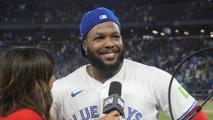 Oct 19, 2025; Toronto, Ontario, CAN; Toronto Blue Jays first baseman Vladimir Guerrero Jr. (27) is interviewed after defeating the Seattle Mariners during game six of the ALCS round for the 2025 MLB playoffs at Rogers Centre. Oct 19, 2025; Toronto, Ontario, CAN; Toronto Blue Jays first baseman Vladimir Guerrero Jr. (27) is interviewed after defeating the Seattle Mariners during game six of the ALCS round for the 2025 MLB playoffs at Rogers Centre.