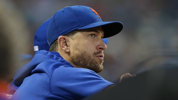 Jul 27, 2021; New York City, New York, USA; New York Mets injured starting pitcher Jacob deGrom (48) watches from the dugout during the third inning against the Atlanta Braves at Citi Field. Mandatory Credit: Brad Penner-Imagn Images Jul 27, 2021; New York City, New York, USA; New York Mets injured starting pitcher Jacob deGrom (48) watches from the dugout during the third inning against the Atlanta Braves at Citi Field. Mandatory Credit: Brad Penner-Imagn Images