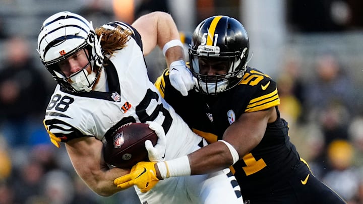 Cincinnati Bengals tight end Hayden Hurst (88) is brought down by Pittsburgh Steelers linebacker