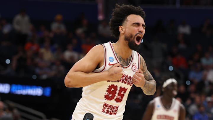 Mar 22, 2026; Tampa, FL, USA; Alabama Crimson Tide guard Houston Mallette (95) celebrates after a play against the Texas Tech Red Raiders in the first half during a second round game of the men's 2026 NCAA Tournament at Benchmark International Arena. Mandatory Credit: Nathan Ray Seebeck-Imagn Images