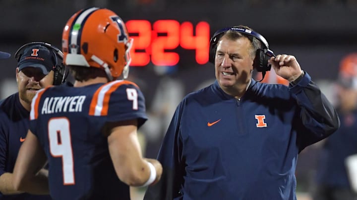 Illinois Fighting Illini head coach Bret Bielema and quarterback Luke Altmyer (9) during the second half against the Western Michigan Broncos at Memorial Stadium. Credit: Ron Johnson-Imagn Images