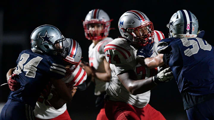 Jefferson County's Nic Moore (74) holds back Farragut's Brice Fontenot (50) during a Class 6A week 1 playoff football game between Farragut and Jefferson County High school in Farragut, Tenn., on Friday, Nov. 4, 2022.

Kns Preps Farragut Vs Jefferson County
