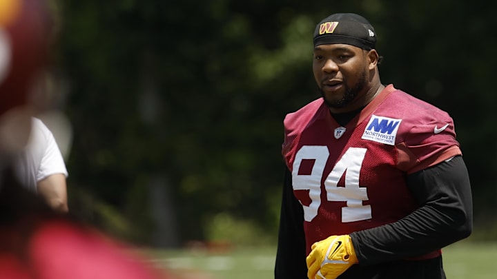 Jun 10, 2025; Ashburn, VA, USA; Washington Commanders defensive tackle Daron Payne (94) stands on the field on day one of minicamp at Commanders Park. Mandatory Credit: Geoff Burke-Imagn Images