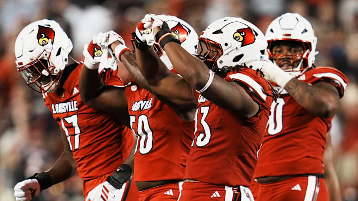 Louisville Cardinals defensive lineman Wesley Bailey (23) makes a heart gesture after his sack against James Madison University in the Card's football game Friday September 5, 2025 at L&N Credit Union Stadium in Louisville, Kentucky. After the game, Bailey said he always does a heart sign after a sack as an honor to his late mother, who was killed when he was five years old. Other Card players have followed his lead.