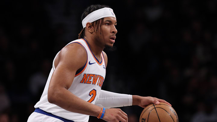 Apr 13, 2025; Brooklyn, New York, USA; New York Knicks guard Miles McBride (2) dribbles up court during the first half against the Brooklyn Nets at Barclays Center. Mandatory Credit: Vincent Carchietta-Imagn Images