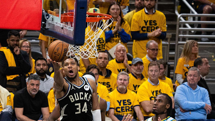 Apr 29, 2025; Indianapolis, Indiana, USA; Milwaukee Bucks forward Giannis Antetokounmpo (34) shoots the ball while Indiana Pacers guard Andrew Nembhard (2) defends during game five of the first round for the 2024 NBA Playoffs at Gainbridge Fieldhouse. Mandatory Credit: Trevor Ruszkowski-Imagn Images Apr 29, 2025; Indianapolis, Indiana, USA; Milwaukee Bucks forward Giannis Antetokounmpo (34) shoots the ball while Indiana Pacers guard Andrew Nembhard (2) defends during game five of the first round for the 2024 NBA Playoffs at Gainbridge Fieldhouse. Mandatory Credit: Trevor Ruszkowski-Imagn Images