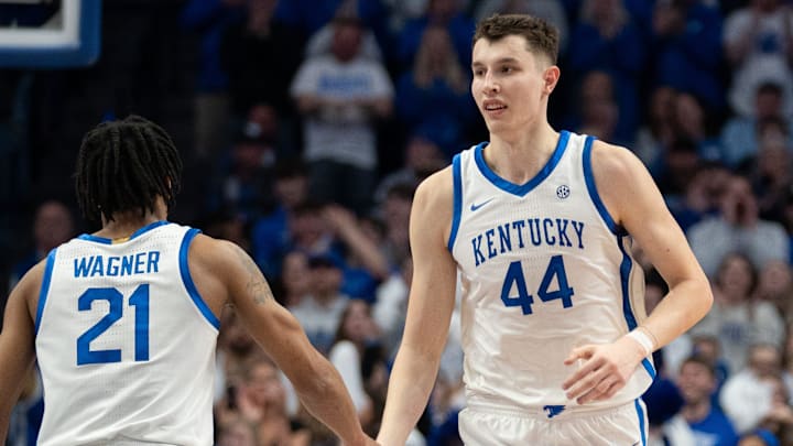 Kentucky Wildcats forward Zvonimir Ivisic (44) celebrates a play with guard D.J. Wagner (21) during