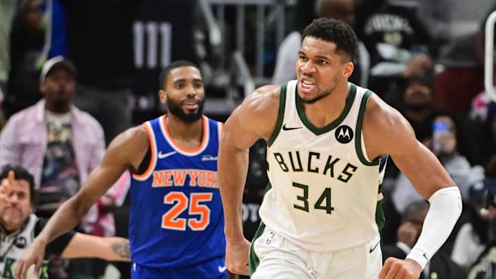 Oct 28, 2025; Milwaukee, Wisconsin, USA; Milwaukee Bucks forward Giannis Antetokounmpo (34) reacts after scoring a basket in the 3rd quarter as New York Knicks guard Mikal Bridges (25) looks on at Fiserv Forum. Mandatory Credit: Benny Sieu-Imagn Images Oct 28, 2025; Milwaukee, Wisconsin, USA; Milwaukee Bucks forward Giannis Antetokounmpo (34) reacts after scoring a basket in the 3rd quarter as New York Knicks guard Mikal Bridges (25) looks on at Fiserv Forum. Mandatory Credit: Benny Sieu-Imagn Images