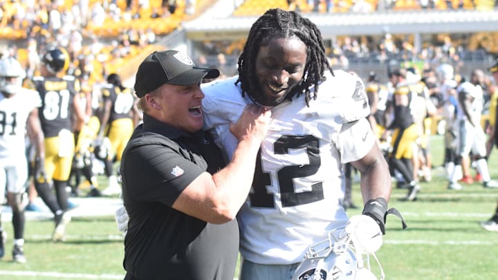 Sep 19, 2021; Pittsburgh, Pennsylvania, USA; Las Vegas Raiders head coach Jon Gruden celebrates a 26-17 win over the Pittsburgh Steelers with linebacker Cory Littleton at Heinz Field. Mandatory Credit: Philip G. Pavely-Imagn Images