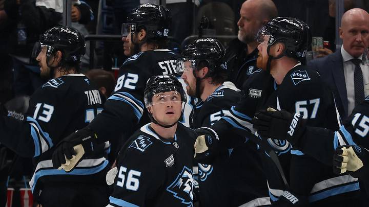 Apr 16, 2026; Salt Lake City, Utah, USA; Utah Mammoth right wing Kailer Yamamoto (56) slaps hands with teammates on the bench after scoring a goal against the St. Louis Blues during the second period at Delta Center. Mandatory Credit: Rob Gray-Imagn Images