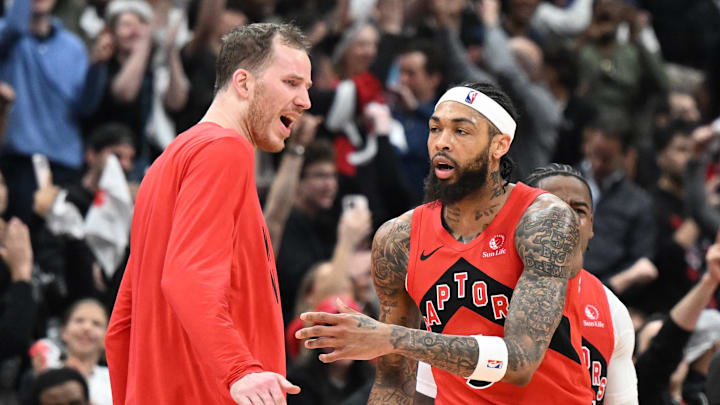 Apr 26, 2026; Toronto, Ontario, CAN;  Toronto Raptors forward Brandon Ingram (3) is greeted by center Jakob Poeltl (19) after sinking a three point basket at the end of the first half against the Cleveland Cavaliers during game four of the first round of the 2026 NBA Playoffs at Scotiabank Arena. Mandatory Credit: Dan Hamilton-Imagn Images