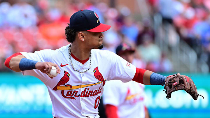 Mar 30, 2025; St. Louis, Missouri, USA; St. Louis Cardinals shortstop Masyn Winn (0) takes aim at first base in a game against the Minnesota Twins at Busch Stadium. Mandatory Credit: Tim Vizer-Imagn Images