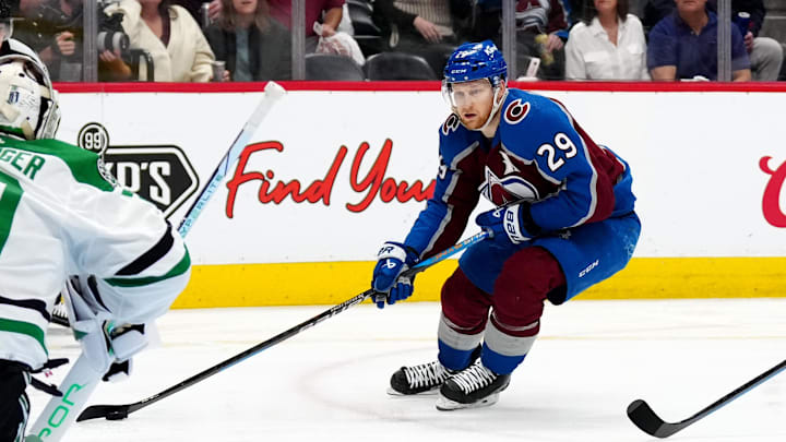 May 17, 2024; Denver, Colorado, USA; Colorado Avalanche center Nathan MacKinnon (29) skates towards Dallas Stars goaltender Jake Oettinger (29) in the second period in game six of the second round of the 2024 Stanley Cup Playoffs at Ball Arena. Mandatory Credit: Ron Chenoy-USA TODAY Sports