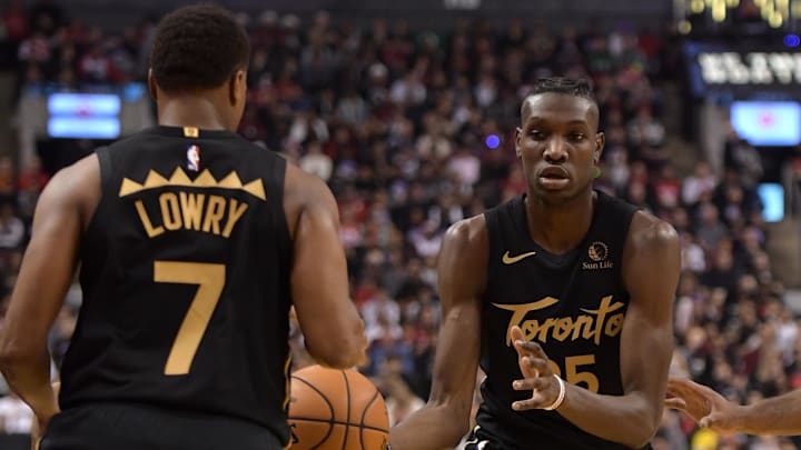 Dec 25, 2019; Toronto, Ontario, CAN; Toronto Raptors forward Chris Boucher (25) passes the ball to guard Kyle Lowry (7) in the first half against Boston Celtics at Scotiabank Arena. Mandatory Credit: Dan Hamilton-Imagn Images Dec 25, 2019; Toronto, Ontario, CAN; Toronto Raptors forward Chris Boucher (25) passes the ball to guard Kyle Lowry (7) in the first half against Boston Celtics at Scotiabank Arena. Mandatory Credit: Dan Hamilton-Imagn Images