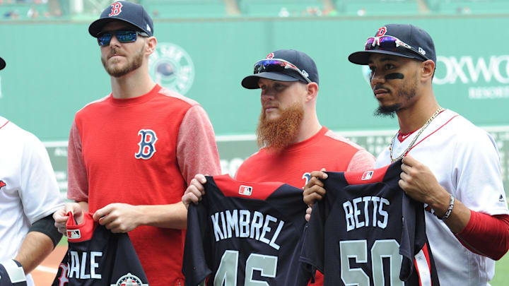 Jul 15, 2018; Boston, MA, USA; Boston Red Sox allstars Chris Sale Craig Kimberly and Mookie Betts hold their all star jerseys prior to a game against the Toronto Blue Jays at Fenway Park. Mandatory Credit: Bob DeChiara-Imagn Images Jul 15, 2018; Boston, MA, USA; Boston Red Sox allstars Chris Sale Craig Kimberly and Mookie Betts hold their all star jerseys prior to a game against the Toronto Blue Jays at Fenway Park. Mandatory Credit: Bob DeChiara-Imagn Images