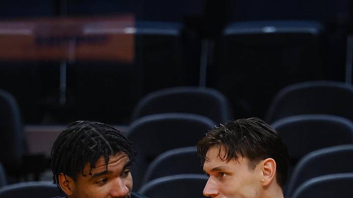 Jul 10, 2024; San Francisco, CA, USA; Miami Heat center Kel'el Ware (7) and guard Pelle Larsson (9) on the bench before a game against the Los Angeles Lakers at Chase Center. Mandatory Credit: Kelley L Cox-USA TODAY Sports