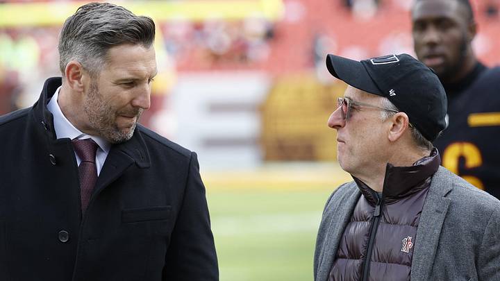 Dec 1, 2024; Landover, Maryland, USA; Washington Commanders general manager Adam Peters (L) talks with Commanders owner Josh Harris (R) on the field prior to the game against the Tennessee Titans at Northwest Stadium. Mandatory Credit: Geoff Burke-Imagn Images