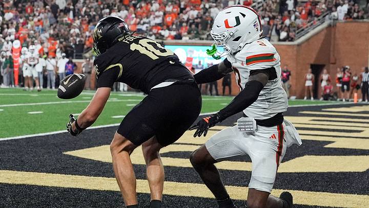 Sep 18, 2026; Winston-Salem, North Carolina, USA; Wake Forest Demon Deacons wide receiver Jack Foley (10) just misses a touchdown pass defended by Miami (FL) Hurricanes defensive back Bryce Fitzgerald (3) during the second half at Allegacy Federal Credit Union Stadium. Mandatory Credit: Jim Dedmon-Imagn Images Sep 18, 2026; Winston-Salem, North Carolina, USA; Wake Forest Demon Deacons wide receiver Jack Foley (10) just misses a touchdown pass defended by Miami (FL) Hurricanes defensive back Bryce Fitzgerald (3) during the second half at Allegacy Federal Credit Union Stadium. Mandatory Credit: Jim Dedmon-Imagn Images