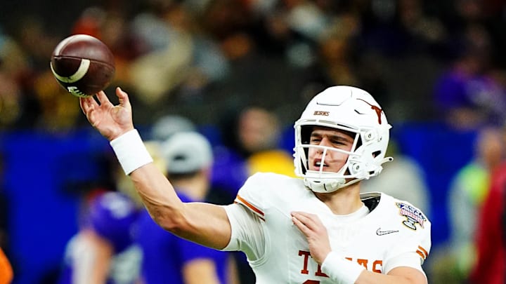 Jan 1, 2024; New Orleans, LA, USA; Texas Longhorns quarterback Arch Manning (16) warms up before playing against the Washington Huskies in the 2024 Sugar Bowl college football playoff semifinal game at Caesars Superdome. Mandatory Credit: John David Mercer-USA TODAY Sports