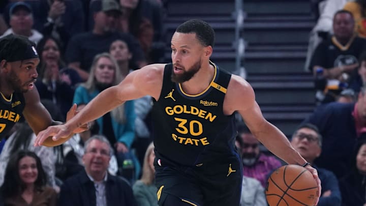 Apr 9, 2025; San Francisco, California, USA;  Golden State Warriors guard Stephen Curry (30) dribbles upcourt against the San Antonio Spurs in the first period at Chase Center. Mandatory Credit: David Gonzales-Imagn Images