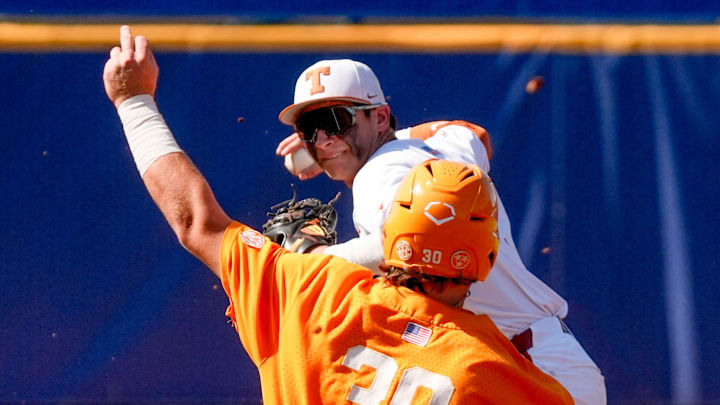 May 22, 2025; Hoover, AL, USA; Texas infielder Ethan Mendoza (5) makes the turn on a double play after forcing out Tennessee designated hitter Levi Clark (30) in the third round of the SEC Baseball Tournament at the Hoover Met.