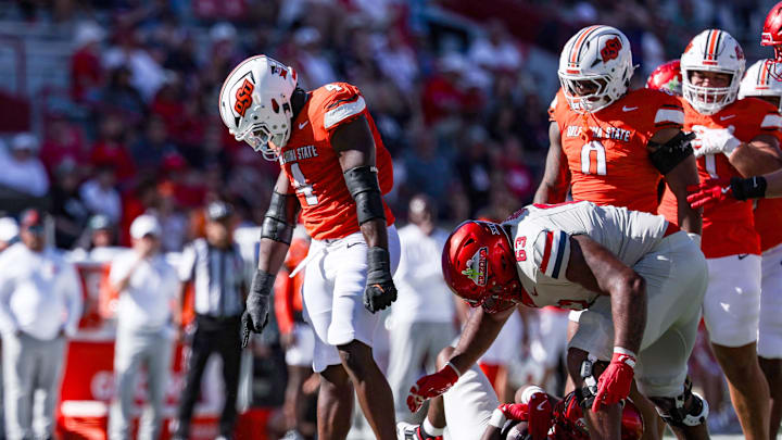 Oklahoma State Cowboys outside linebacker Wendell Gregory (4) reacts after he sacked the Arizona Wildcats quarterback during the fourth quarter of the game at Arizona Stadium. 