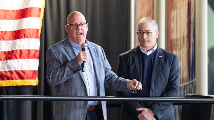 Apr 15, 2025; Saint Paul, Minnesota, USA; Prior to the game between the Minnesota Wild and Anaheim Ducks, Bob Motzko is announced as the head coach for the 2026 IIHF World Junior Hockey Championship by John Vanbiesbrouck (right). The ceremony was held at Xcel Energy Center. Mandatory Credit: Matt Blewett-Imagn Images
