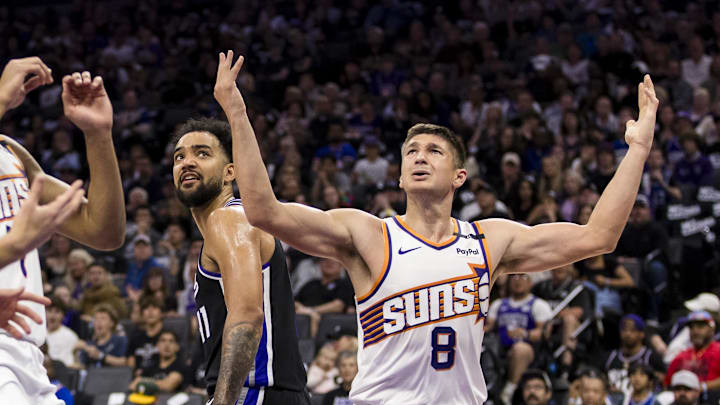 Phoenix Suns guard Grayson Allen reacts after engaging Sacramento Kings forward Trey Lyles. Phoenix Suns guard Grayson Allen reacts after engaging Sacramento Kings forward Trey Lyles.