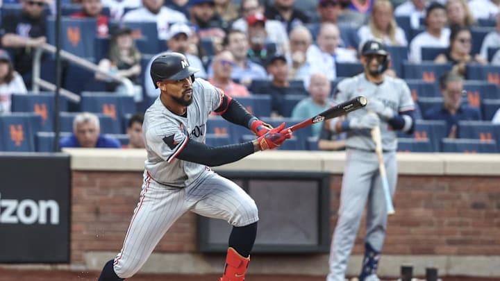 Jul 29, 2024; New York City, New York, USA;  Minnesota Twins center fielder Byron Buxton (25) hits an RBI single in the first inning against the New York Mets at Citi Field. Mandatory Credit: Wendell Cruz-Imagn Images