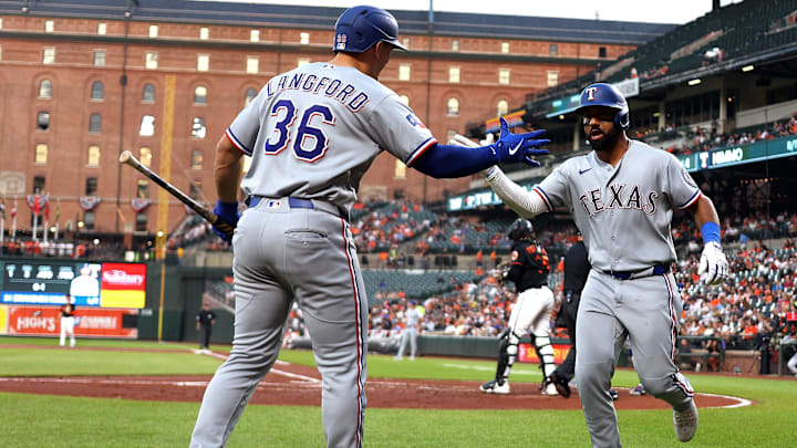 Mar 31, 2026; Baltimore, Maryland, USA; Texas Rangers shortstop Ezequiel Duran (20) celebrates with Texas Rangers left fielder Wyatt Langford (36) after hitting a home run during the third inning against the Baltimore Orioles at Oriole Park at Camden Yards. Mandatory Credit: Daniel Kucin Jr.-Imagn Images