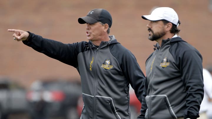 Irondequoit defensive coordinator Chris Battaglia, left, and head coach Dan Fichter during a regular season game at Brighton High School on Saturday, Sept. 9, 2017. Irondequoit beat Brighton 27-14. Battaglia was the longtime head coach at Aquinas Institute.

Roc 090917 Ihs Brighton Football G