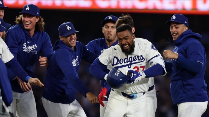 Jul 2, 2024; Los Angeles, California, USA; Los Angeles Dodgers left fielder Teoscar Hernandez (37) celebrates with teammates after hitting a walk off hit to defeat the Arizona Diamondbacks in bottom of the ninth inning at Dodger Stadium. Mandatory Credit: Kiyoshi Mio-USA TODAY Sports Jul 2, 2024; Los Angeles, California, USA; Los Angeles Dodgers left fielder Teoscar Hernandez (37) celebrates with teammates after hitting a walk off hit to defeat the Arizona Diamondbacks in bottom of the ninth inning at Dodger Stadium. Mandatory Credit: Kiyoshi Mio-USA TODAY Sports