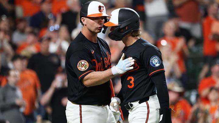 Mar 31, 2026; Baltimore, Maryland, USA; Baltimore Orioles left fielder Taylor Ward (3) celebrates with first baseman Pete Alonso (25) after scoring a run during the fifth inning against the Texas Rangers at Oriole Park at Camden Yards. Mandatory Credit: Daniel Kucin Jr.-Imagn Images