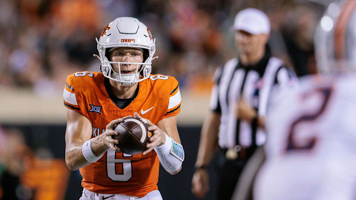 Aug 28, 2025; Stillwater, Oklahoma, USA; Oklahoma State Cowboys quarterback Zane Flores (6) behind the line during the second half against the Tennessee Martin Skyhawks at Boone Pickens Stadium. Mandatory Credit: William Purnell-Imagn Images Aug 28, 2025; Stillwater, Oklahoma, USA; Oklahoma State Cowboys quarterback Zane Flores (6) behind the line during the second half against the Tennessee Martin Skyhawks at Boone Pickens Stadium. Mandatory Credit: William Purnell-Imagn Images