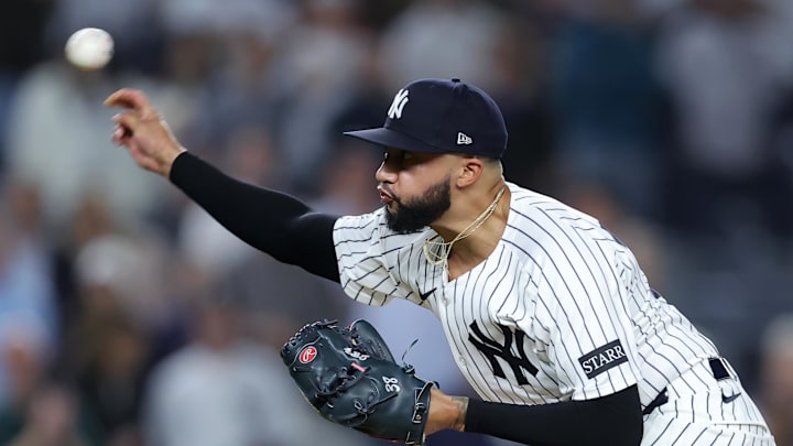 Jun 3, 2025; Bronx, New York, USA; New York Yankees relief pitcher Devin Williams (38) pitches against the Cleveland Guardians during the ninth inning at Yankee Stadium. Mandatory Credit: Brad Penner-Imagn Images