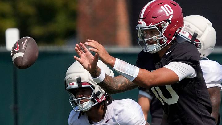 Aug. 7, 2026; Tuscaloosa, AL, USA; Quarterback Austin Mack takes a snap during practice for the Alabama Crimson Tide. Aug. 7, 2026; Tuscaloosa, AL, USA; Quarterback Austin Mack takes a snap during practice for the Alabama Crimson Tide.