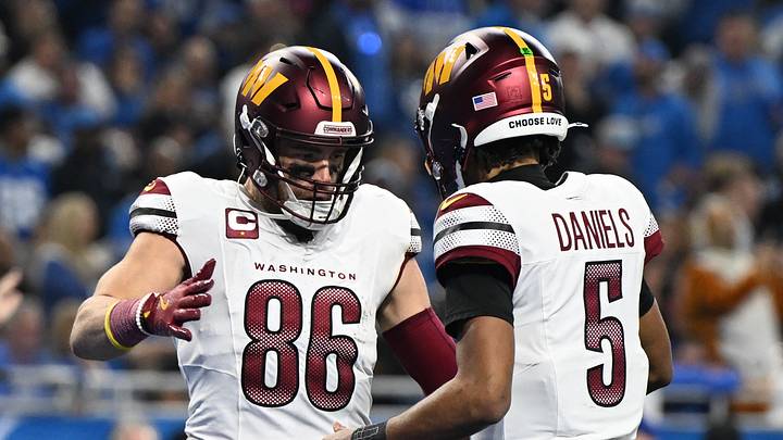 Jan 18, 2025; Detroit, Michigan, USA; Washington Commanders tight end Zach Ertz (86) celebrates touchdown pass with quarterback Jayden Daniels (5) during the second quarter in a 2025 NFC divisional round game at Ford Field. Mandatory Credit: Lon Horwedel-Imagn Images Jan 18, 2025; Detroit, Michigan, USA; Washington Commanders tight end Zach Ertz (86) celebrates touchdown pass with quarterback Jayden Daniels (5) during the second quarter in a 2025 NFC divisional round game at Ford Field. Mandatory Credit: Lon Horwedel-Imagn Images