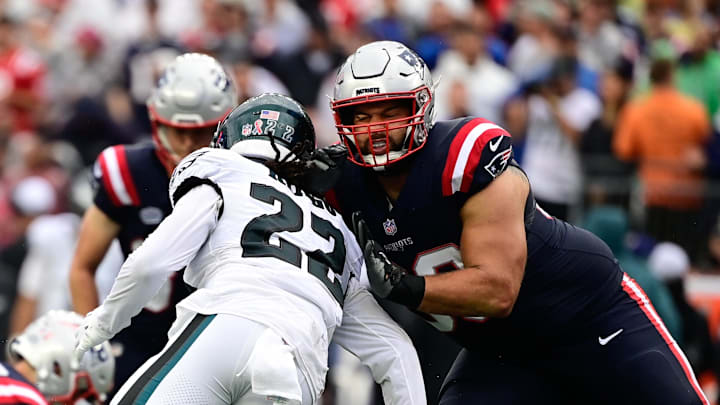 Sep 10, 2023; Foxborough, Massachusetts, USA; New England Patriots defensive end Lawrence Guy Sr. (93) blocks Philadelphia Eagles conner back Kelee Ringo (22) during the first half at Gillette Stadium. Mandatory Credit: Eric Canha-Imagn Images Sep 10, 2023; Foxborough, Massachusetts, USA; New England Patriots defensive end Lawrence Guy Sr. (93) blocks Philadelphia Eagles conner back Kelee Ringo (22) during the first half at Gillette Stadium. Mandatory Credit: Eric Canha-Imagn Images