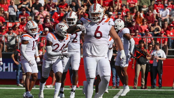 Sep 16, 2023; Piscataway, New Jersey, USA; Virginia Tech Hokies defensive lineman Josh Fuga (6) celebrates a defensive stop during the first half against the Rutgers Scarlet Knights at SHI Stadium. Mandatory Credit: Vincent Carchietta-Imagn Images