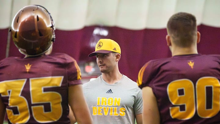 Special Teams Coordinator Jack Nudo works with kickers during practice at the Kajikawa Practice fields on Nov. 11, 2025, in Tempe, Arizona. Special Teams Coordinator Jack Nudo works with kickers during practice at the Kajikawa Practice fields on Nov. 11, 2025, in Tempe, Arizona.