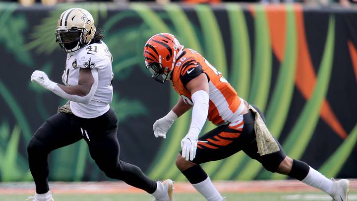 New Orleans Saints running back Alvin Kamara (41) carries the ball as Cincinnati Bengals outside linebacker Jordan Evans (50) defends during a Week 10 NFL game between the New Orleans Saints and the Cincinnati Bengals, Sunday, Nov. 11, 2018, at Paul Brown Stadium in Cincinnati. 

Cincinnati Bengals Vs New Orleans Saints Nov 11