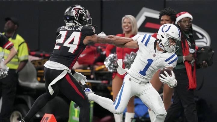 Dec 24, 2023; Atlanta, Georgia, USA; Atlanta Falcons cornerback A.J. Terrell Jr. (24) shoves Indianapolis Colts wide receiver Josh Downs (1) as he rushes the ball along the sideline during a game against the Atlanta Falcons at Mercedes-Benz Stadium. Mandatory Credit: Bob Scheer-USA TODAY Sports Dec 24, 2023; Atlanta, Georgia, USA; Atlanta Falcons cornerback A.J. Terrell Jr. (24) shoves Indianapolis Colts wide receiver Josh Downs (1) as he rushes the ball along the sideline during a game against the Atlanta Falcons at Mercedes-Benz Stadium. Mandatory Credit: Bob Scheer-USA TODAY Sports