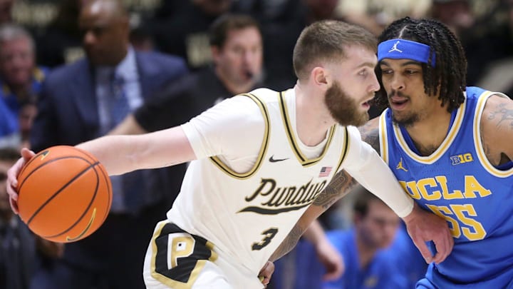 Purdue Boilermakers guard Braden Smith (3) is defended by UCLA Bruins guard Skyy Clark (55) 