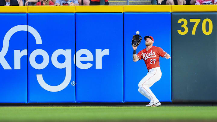 Jun 3, 2025; Cincinnati, Ohio, USA; Cincinnati Reds outfielder Jake Fraley (27) catches a fly out hit by Milwaukee Brewers outfielder Isaac Collins (not pictured) in the second inning at Great American Ball Park. Mandatory Credit: Katie Stratman-Imagn Images Jun 3, 2025; Cincinnati, Ohio, USA; Cincinnati Reds outfielder Jake Fraley (27) catches a fly out hit by Milwaukee Brewers outfielder Isaac Collins (not pictured) in the second inning at Great American Ball Park. Mandatory Credit: Katie Stratman-Imagn Images