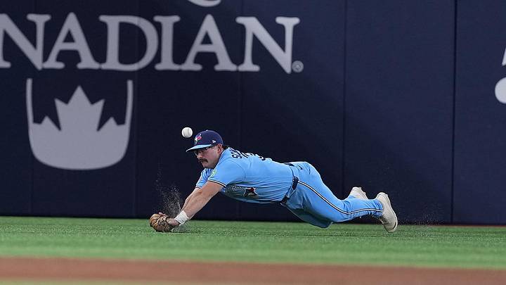 May 12, 2026; Toronto, Ontario, CAN; Toronto Blue Jays left fielder Davis Schneider (36) is unable to catch a fly ball against the Tampa Bay Rays during the seventh inning at Rogers Centre. Mandatory Credit: Nick Turchiaro-Imagn Images May 12, 2026; Toronto, Ontario, CAN; Toronto Blue Jays left fielder Davis Schneider (36) is unable to catch a fly ball against the Tampa Bay Rays during the seventh inning at Rogers Centre. Mandatory Credit: Nick Turchiaro-Imagn Images