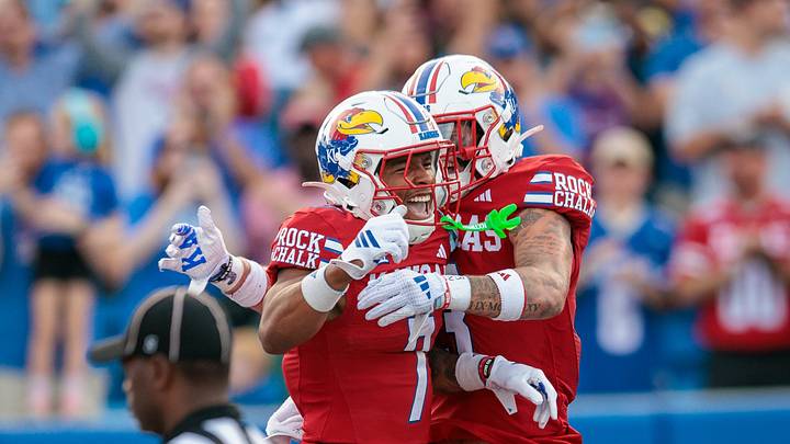 Aug 29, 2025; Lawrence, Kansas, USA; Kansas Jayhawks wide receiver Cam Pickett (7) and Kansas Jayhawks wide receiver Keaton Kubecka (3) celebrate after a touchdown during the first half against the Wagner Seahawks at David Booth Kansas Memorial Stadium. Mandatory Credit: William Purnell-Imagn Images Aug 29, 2025; Lawrence, Kansas, USA; Kansas Jayhawks wide receiver Cam Pickett (7) and Kansas Jayhawks wide receiver Keaton Kubecka (3) celebrate after a touchdown during the first half against the Wagner Seahawks at David Booth Kansas Memorial Stadium. Mandatory Credit: William Purnell-Imagn Images