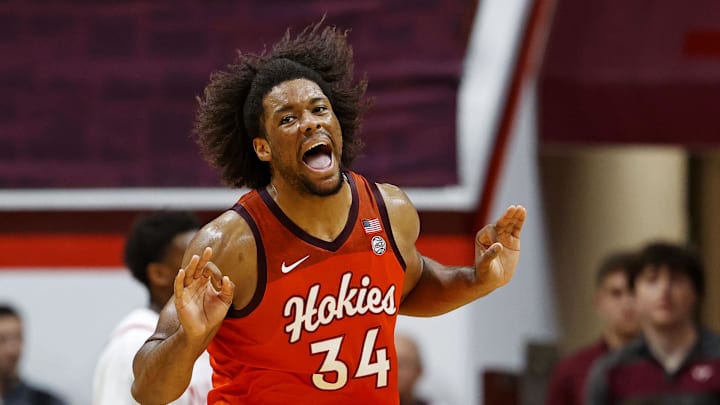Dec 15, 2024; Blacksburg, Virginia, USA; Virginia Tech Hokies forward Mylyjael Poteat (34) celebrates after making a basket during the second half against the Navy Midshipmen at Cassell Coliseum. Mandatory Credit: Peter Casey-Imagn Images