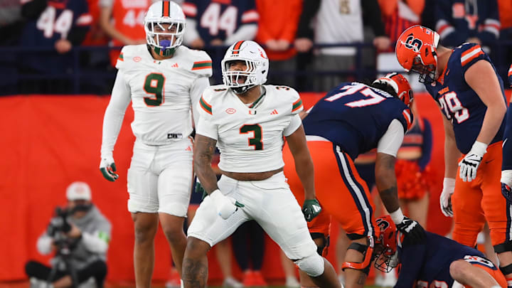 Nov 30, 2024; Syracuse, New York, USA; Miami Hurricanes defensive lineman Akheem Mesidor (3) reacts after a play against the Syracuse Orange during the first half at the JMA Wireless Dome. Mandatory Credit: Rich Barnes-Imagn Images